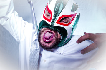 annoyed, angry businessman with Mexican wrestler mask, expressio