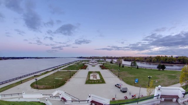 View of the city park strelka in Yaroslavl located along the Volga river embankment day to night timelapse