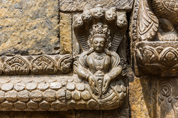 Fototapeta na wymiar Hindu deity stone relief
