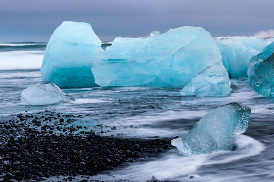 Icebergs on the black sand volcanic beach,  Vatnajokull Glacier, Iceland.