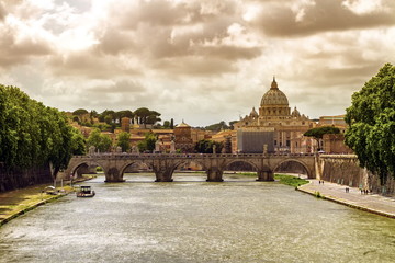 Tiber river, Ponte Sant'Angelo and St. Peter's cathedral, Roma, Italy