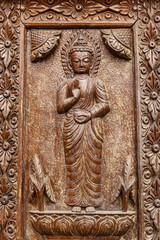 Fototapeta na wymiar Carved medicine Buddha