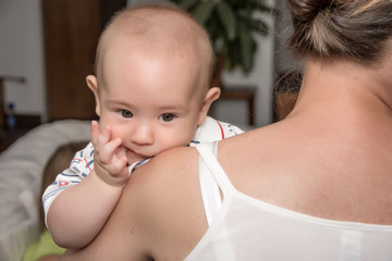Portrait of angelic baby and his mother