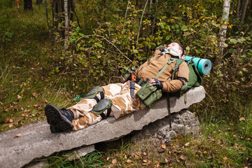 Soldier relaxing on reinforced concrete slab