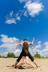 Contemporary dance. Young couple dancing.