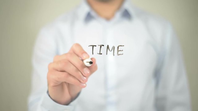 Time Zones, man writing on transparent screen