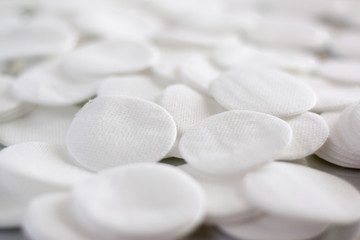 Fototapeta na wymiar Cotton round cosmetic pads, evenly distributed