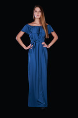 Beautiful girl in Studio on dark background dress