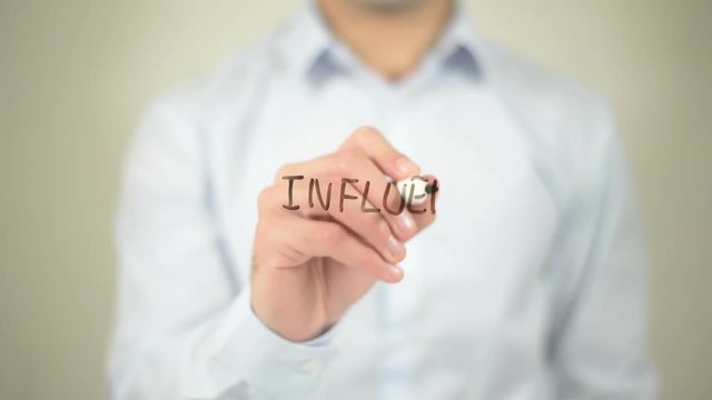 Influence Is Power , man writing on transparent screen