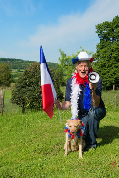 French Soccer fan with dog and megaphone