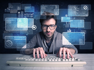 Nerd with glasses hacking websites