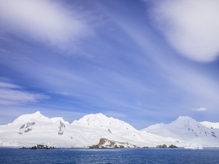 sun and spectacular coulds over antarctica - stock image