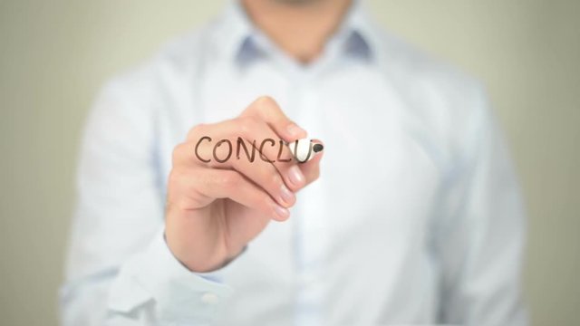 Conclusion, man writing on transparent screen