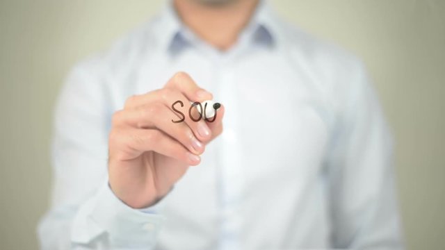 Source, man writing on transparent screen