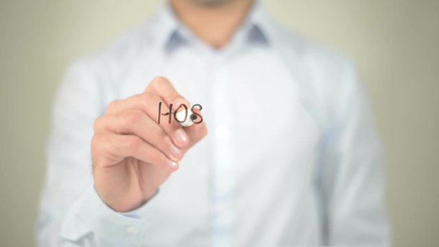 Hosting, man writing on transparent screen