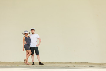 Fashion couple posing outdoor on stage.