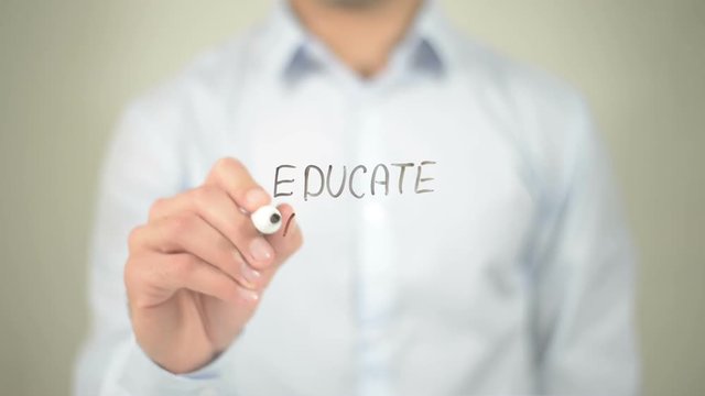 Educate Yourself ,  man writing on transparent screen