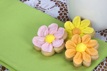 Home made designer Flower Sugar cookies on green napkin