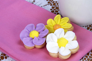 Home made designer Flower Sugar cookies on pink napkin