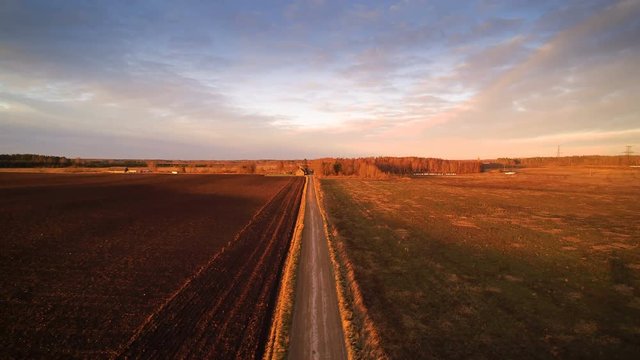The long road in between the rice fields in Saaremaa in Estonia