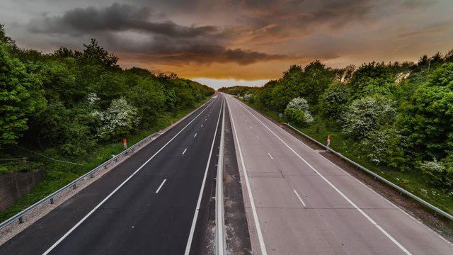 Dramatic Sunset Clouds over Busy Motorway Static Frame