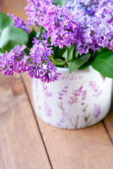 Ceramic pot with purple lilac