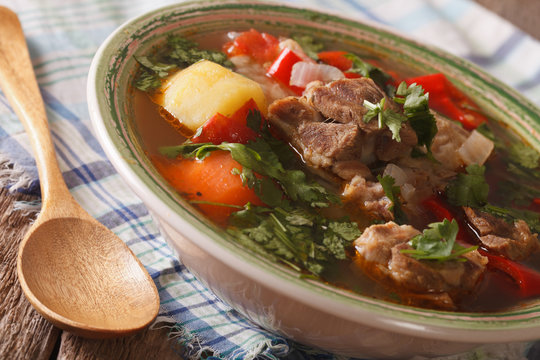 Arabic thick lamb soup with vegetables closeup. horizontal
