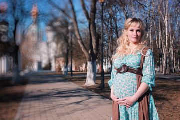 autumn pregnant woman outdoors