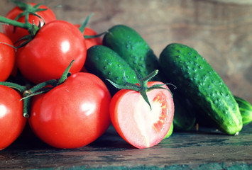 tomatoes on wooden background