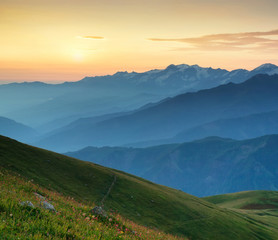 Fototapeta premium Mountain ridge during sunrise. Beautiful natural landscape in the summer time