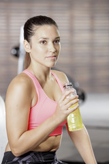 fit woman with energy drink