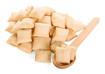 Dry breakfast and wooden spoon isolated on white background.