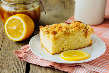 Piece of lemon cake on white dish