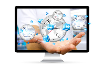 Businessman holding time of the world in his hand