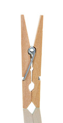 Wooden clothespin close-up isolated on white.