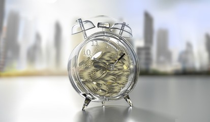 Savings in a transparent glass alarm clock -money concept