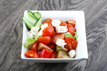 Salad with mozzarella, tomato and cucumber