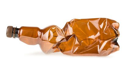 Crumpled brown plastic bottle