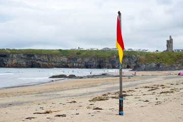 red and yellow warning flag at beach