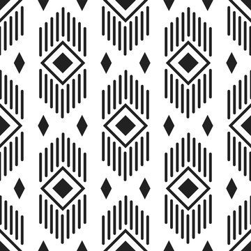 Black and white ethnic geometric lines and rhombuses seamless pattern. Monochrome abstract geometry continuous print.