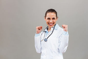 Beautiful female doctor is excited because of something