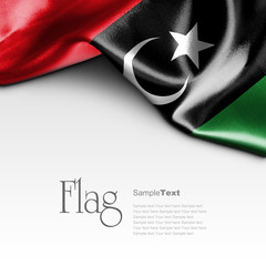 Flag of Libya on white background. Sample text. - obrazy, fototapety, plakaty