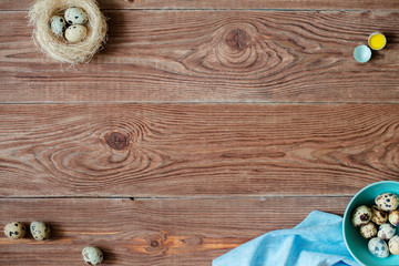 Wooden backgrond with quail eggs