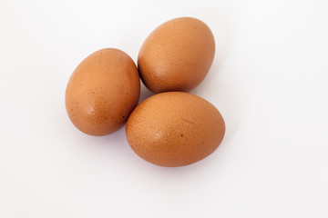 three eggs isolated on white background