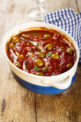 Baked fish with tomatoes and olives
