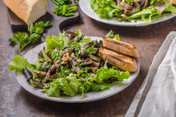 Mushroom salad with walnuts