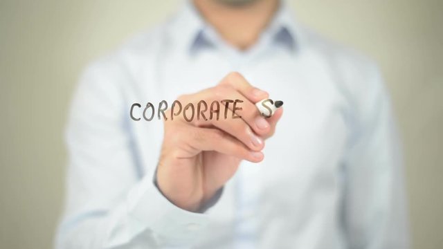 Corporate Social Responsibility   ,  man writing on transparent wall