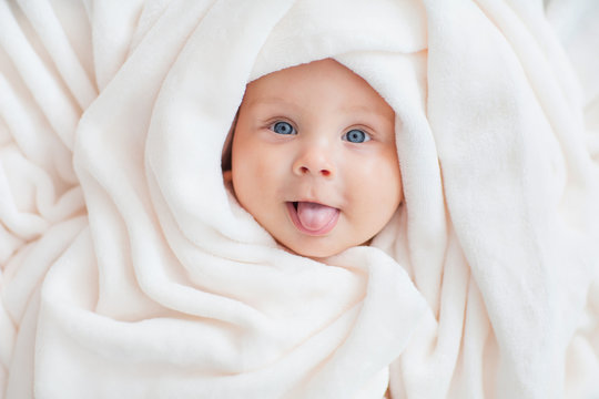 baby with towel