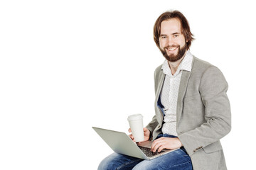 business man working on his laptop and looking at camera. emotio