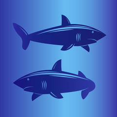 Two sharks in deep blue sea.